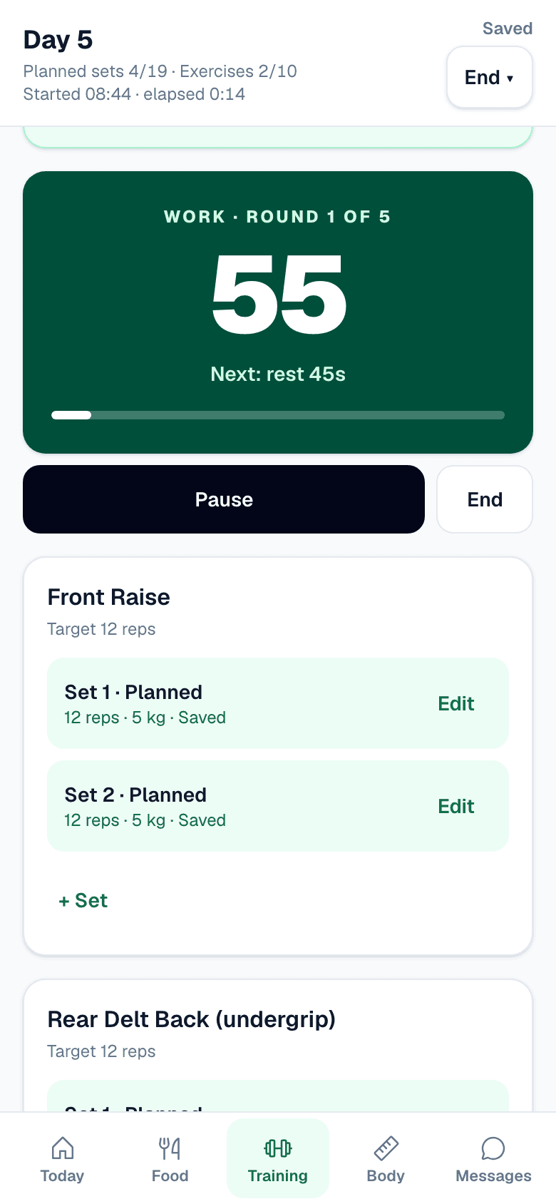 The interval timer running on a phone: work, round one of five, a large countdown and Pause and End buttons